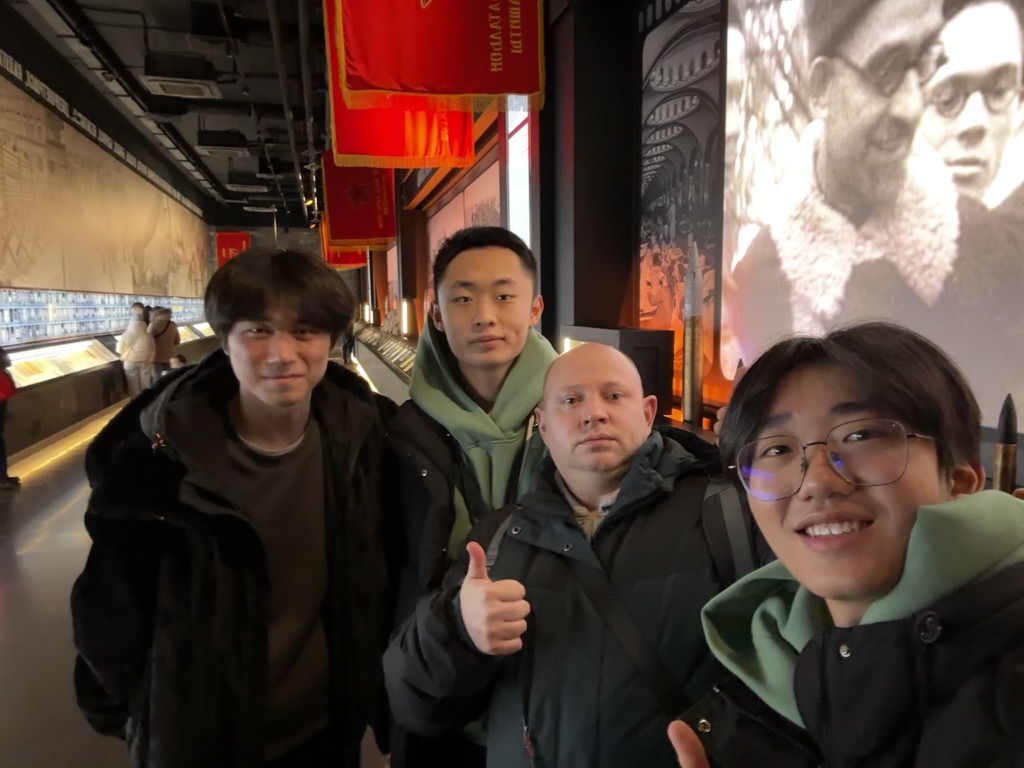 A group selfie inside a museum