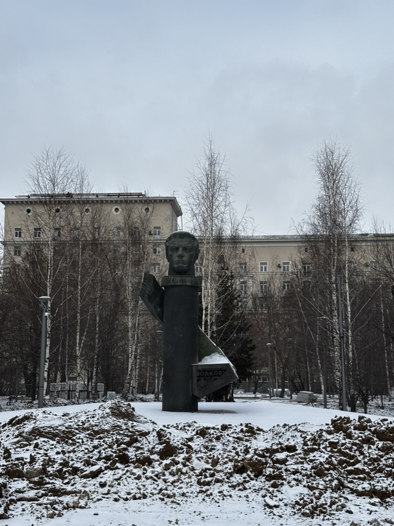 A monument on a snowy campus